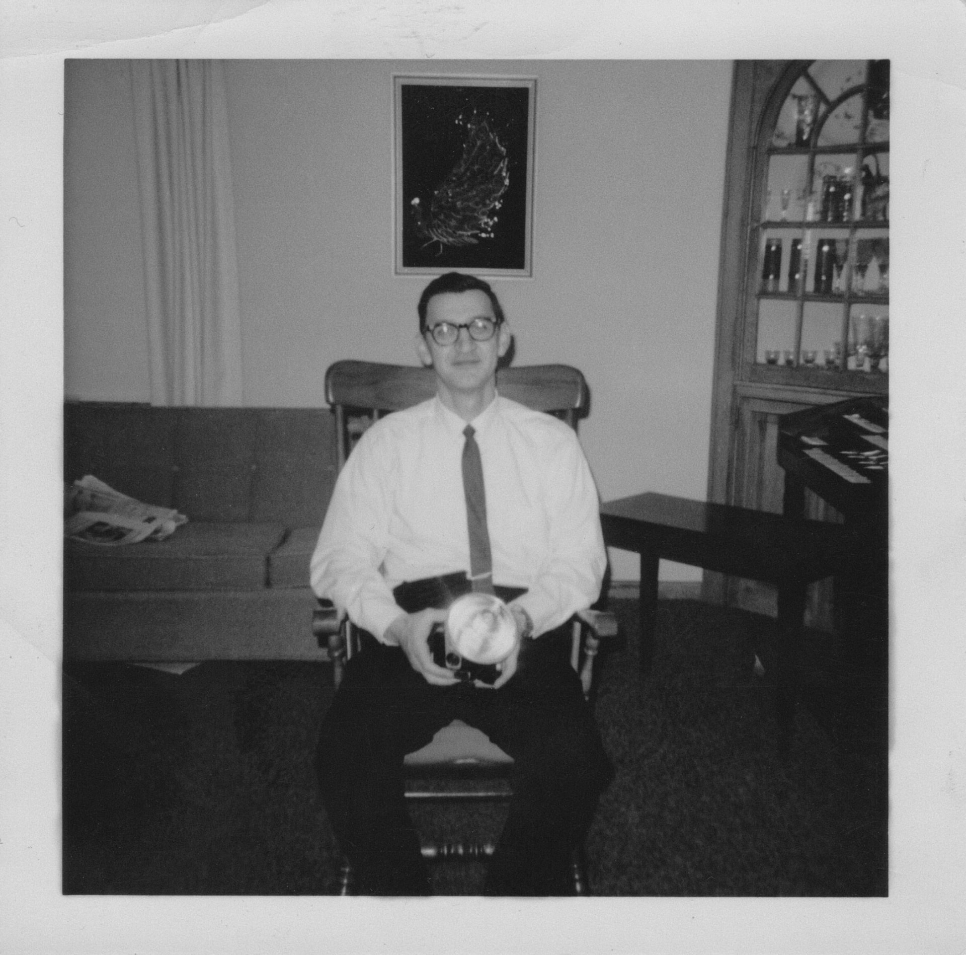 Leonard Ristow, Jr. holding his Kodak Brownie Hawkeye camera with flash, Minnesota, 1968