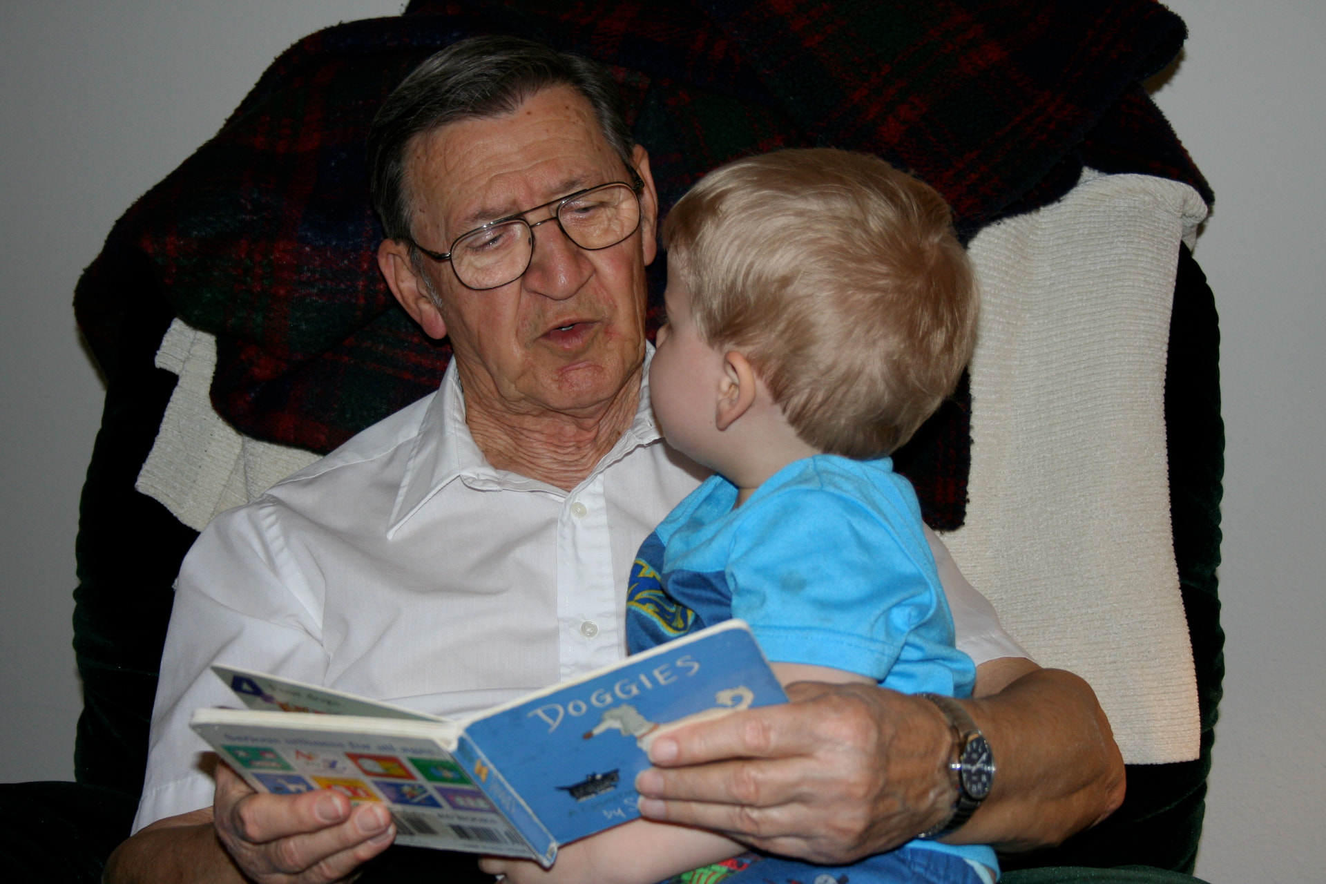 Leonard Ristow, Jr. reading a story to his grandson Matthew