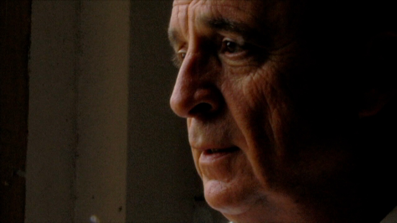 David Goeke in profile, saying goodbye to the old campus