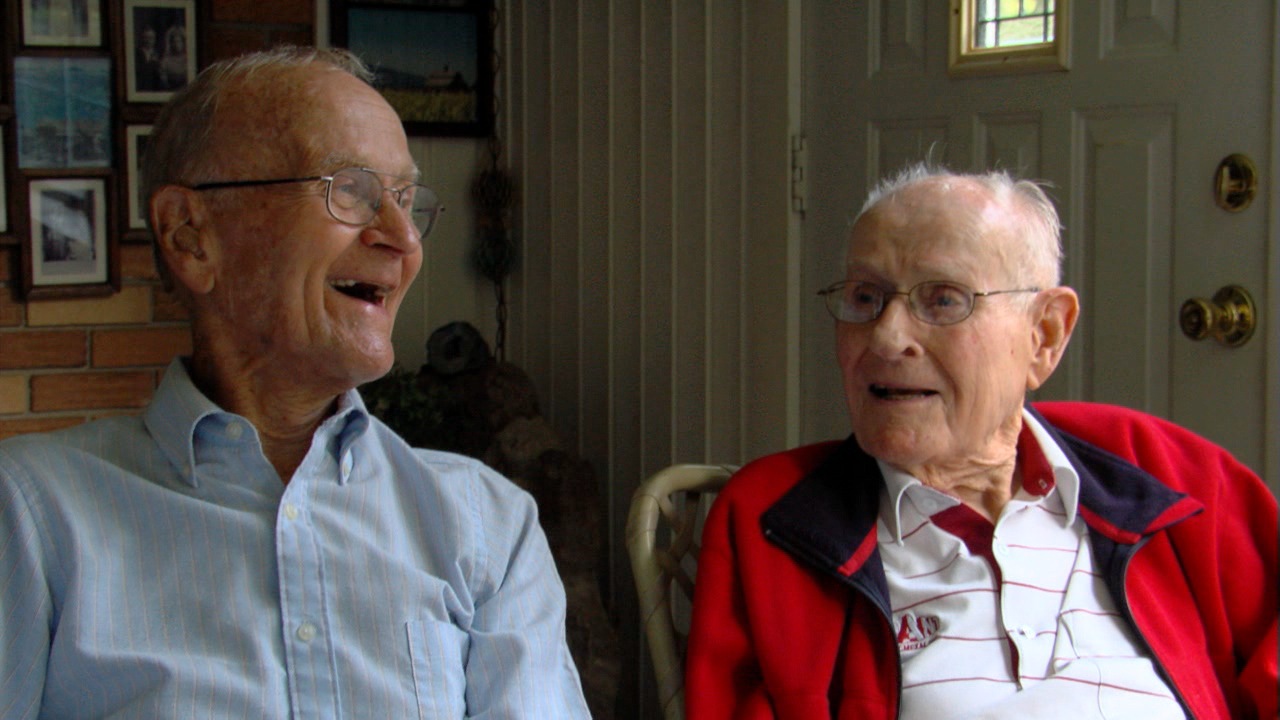 Rev. Elmer Klenk and Rev. Walter Bielefeldt sharing memories for Crossing Jordan