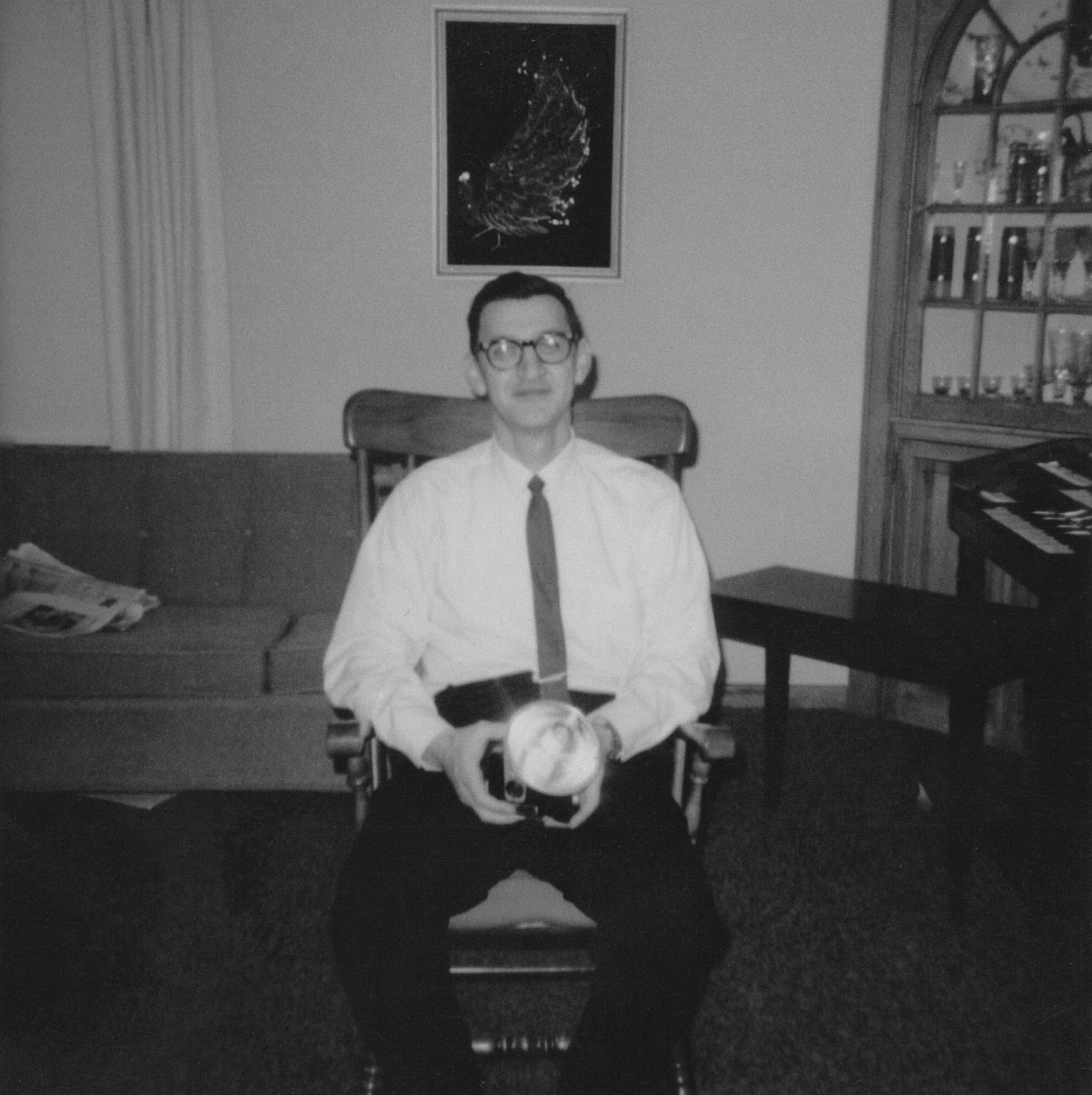 Leonard Ristow, Jr. holding his Kodak Brownie Hawkeye camera with flash, Minnesota, 1968